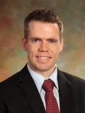 Portrait of Caleb J. Behrend, MD