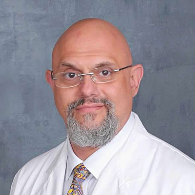 Portrait of George C. Angelos, MD